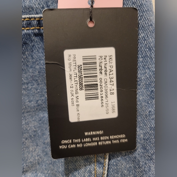 Brand new with tags Pretty Little Thing Mid Blue Knee Rip Mom Jeans Size 12 - Picture 5 of 5